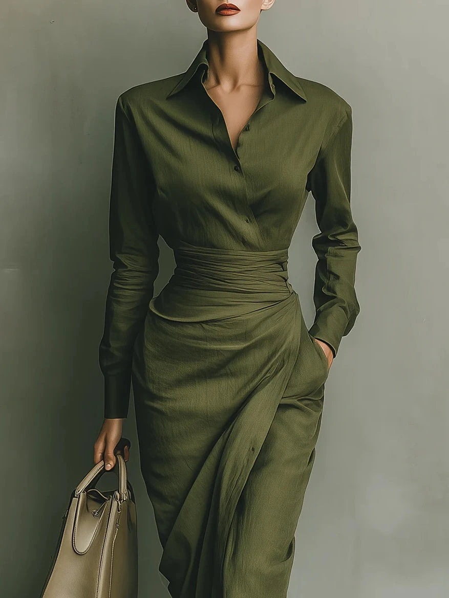 Woman wearing a military green maxi dress in an outdoor setting