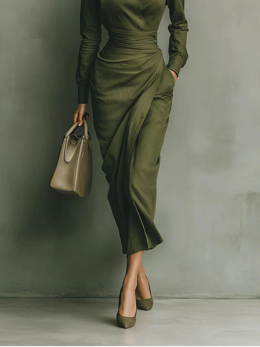 Woman wearing a military green maxi dress in a lifestyle setting