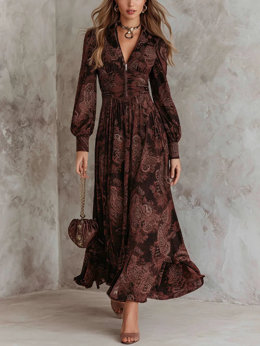 Woman wearing a brown paisley print long-sleeve fitted maxi dress, front view