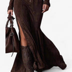 Close-up of a brown zip-front long sleeve maxi dress showing the front zip detail