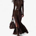 Woman wearing a brown zip-front long sleeve maxi dress in a lifestyle setting
