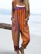 Woman wearing an orange and navy striped sunset print jumpsuit, product catalog photo