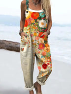 Woman wearing a cream wildflower print jumpsuit, product catalog photo
