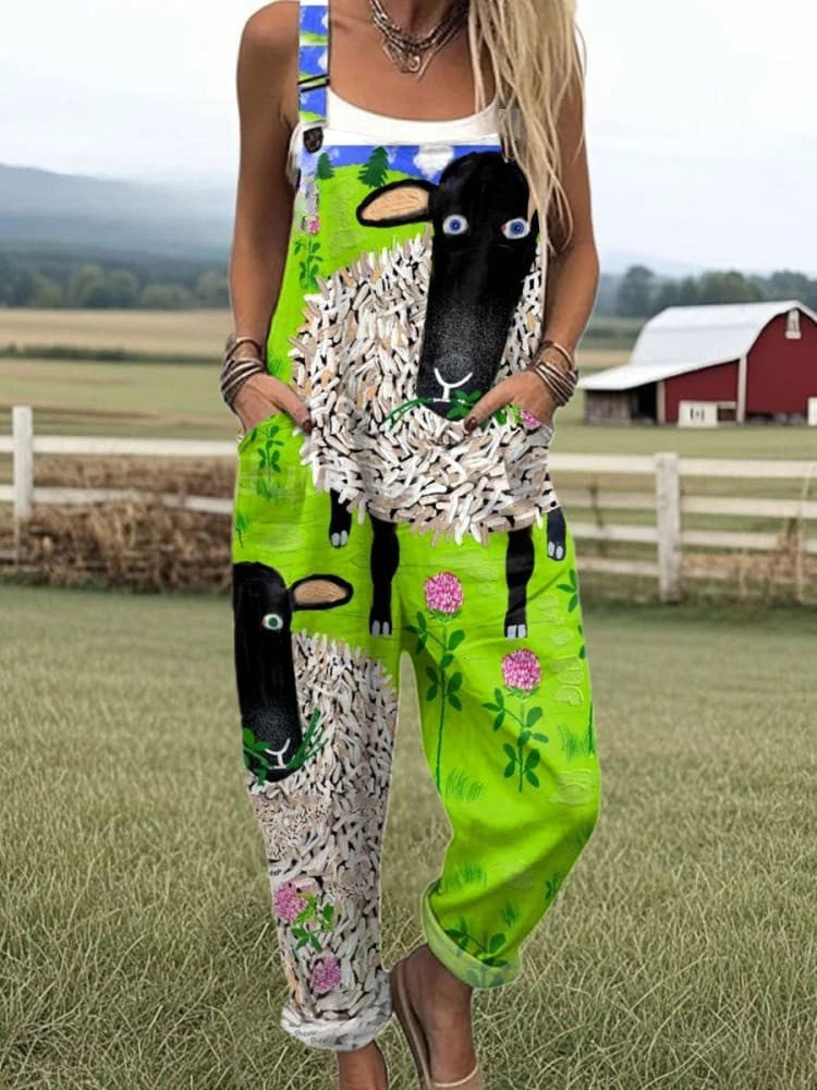 Woman wearing a green sheep and floral print jumpsuit, product catalog photo