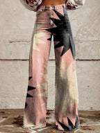Close-up of pink bohemian chic high-waisted pants with a black star print, front view