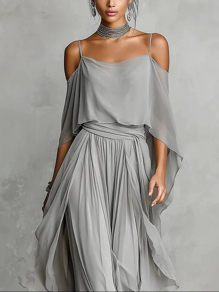 Woman wearing a multicolor flowing two-piece set in a lifestyle setting