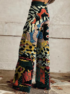 Close-up of black chic wide-leg trousers with a multicolor animal-print pattern, back view